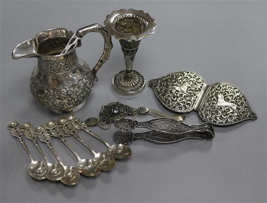 A Chinese cream jug and a small group of mixed metal items.